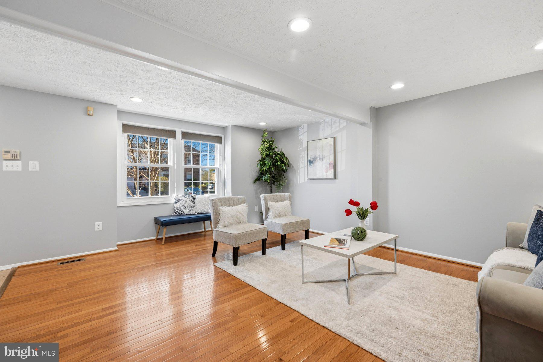 5 Pontiac Way Gaithersburg, MD 20878 - Photo 5 of 40 a living room with furniture and wooden floor