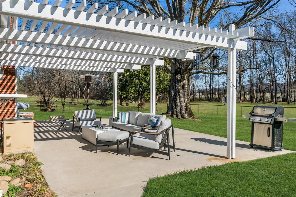 251 Miller Road Hillsboro, TN 37342 - Photo 62 of 80 a view of a patio with a table chairs and a patio