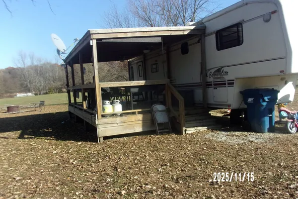 a view of outdoor space with trees all around