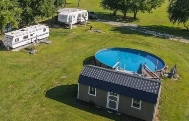 a view of a house with a swimming pool