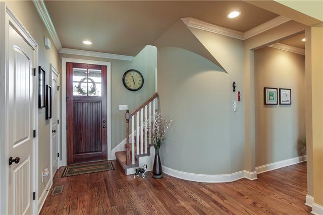 Elegant Foyer with curved wall