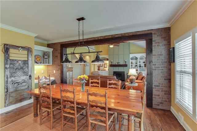 Stone walls accent the kitchen and eating areas