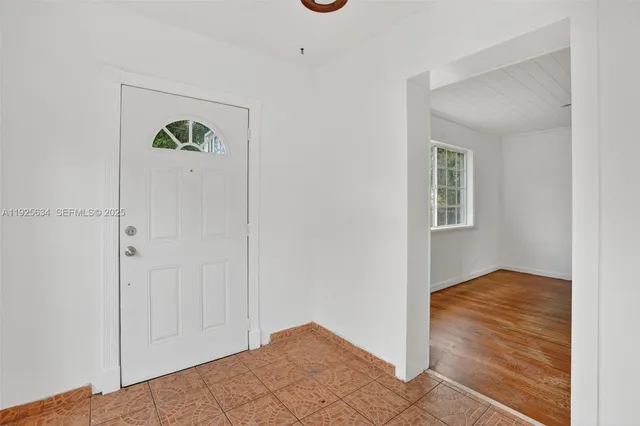 an empty room that has a window