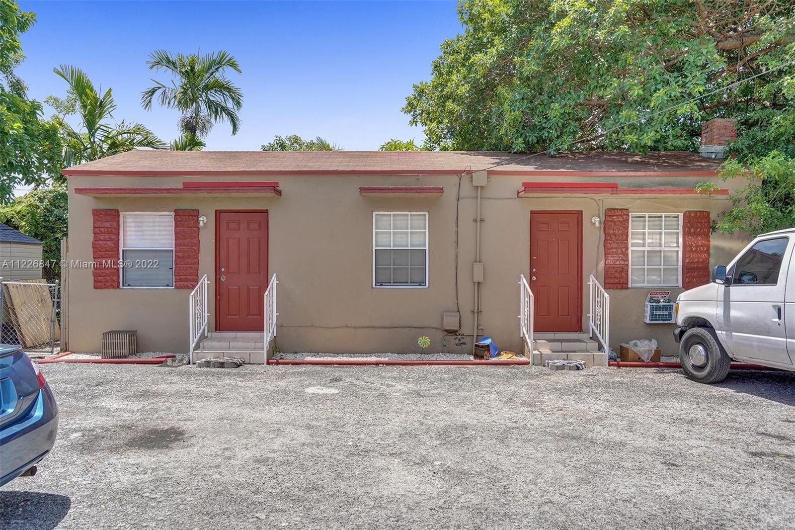 1554 Northwest 58th Street Miami, FL 33142 - Photo 21 of 57 Rear - Right door is formal entrance door