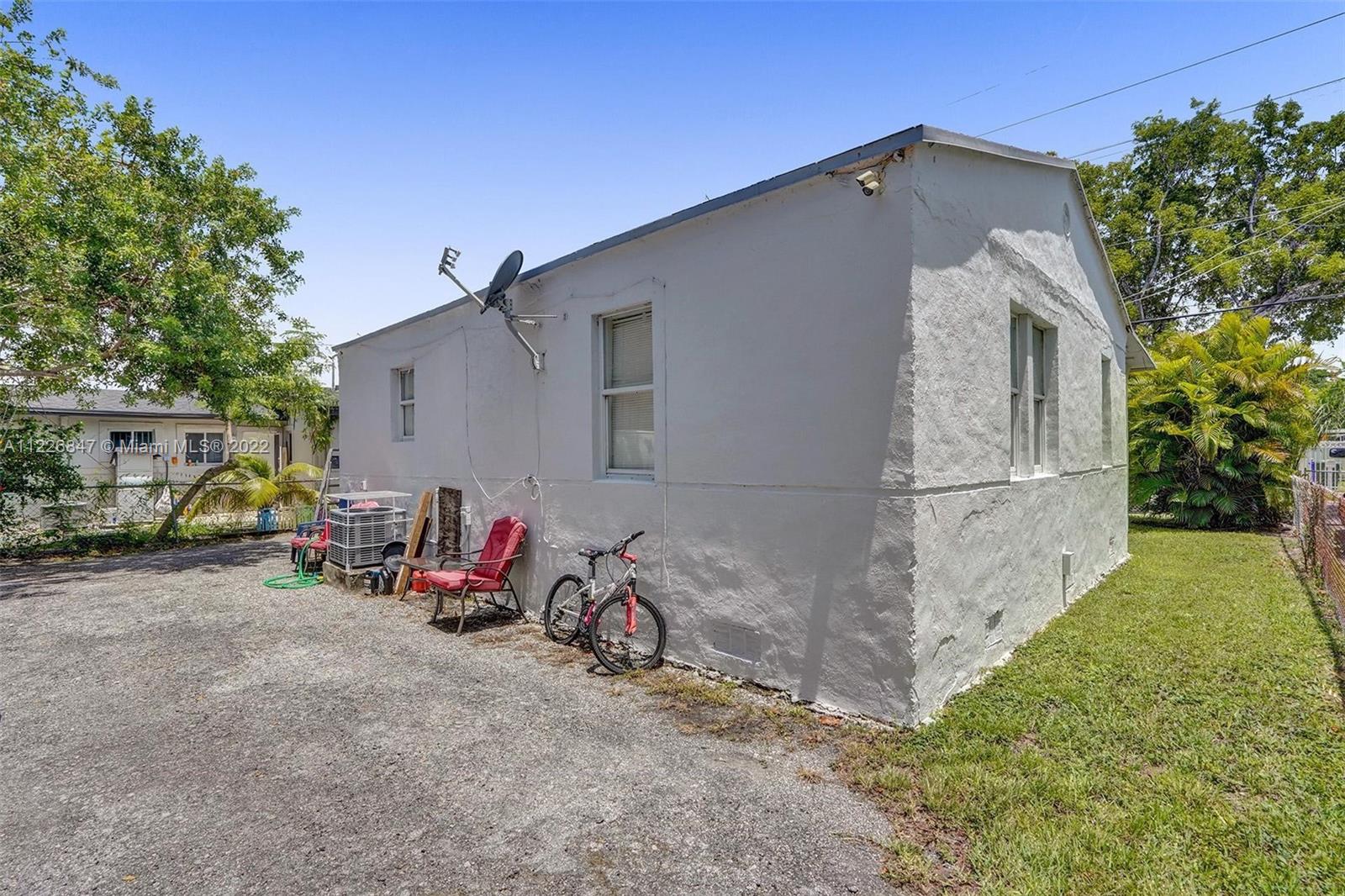 1554 Northwest 58th Street Miami, FL 33142 - Photo 37 of 57 a view of a back yard of the house
