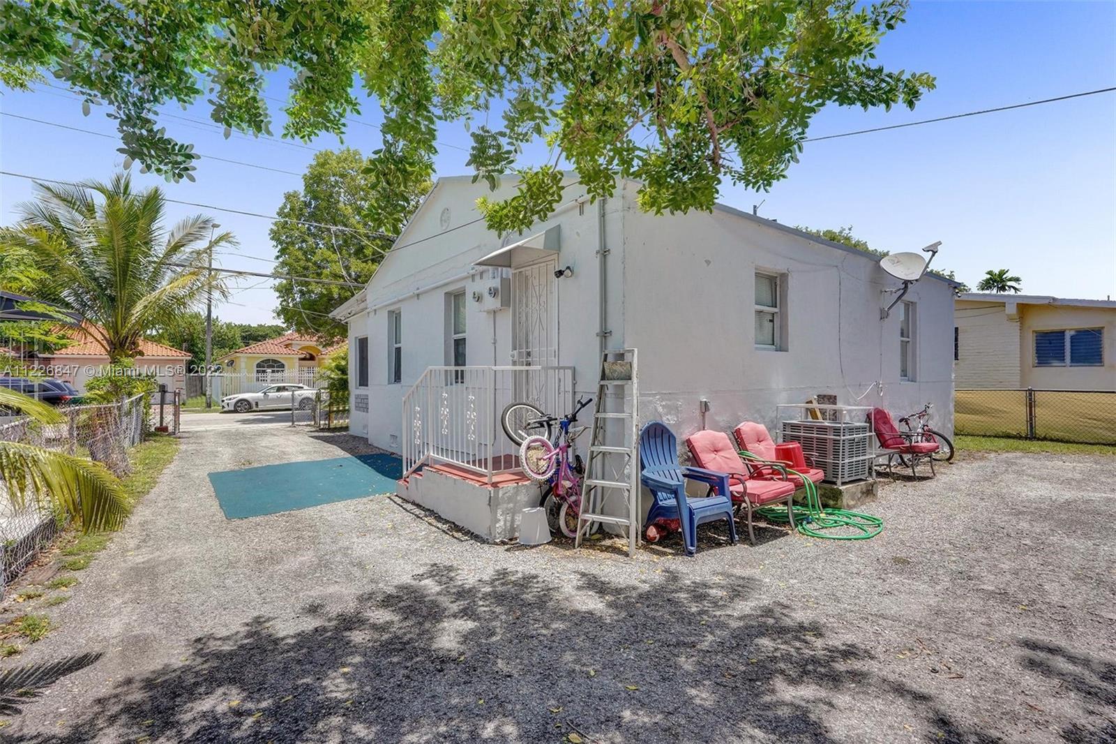 1554 Northwest 58th Street Miami, FL 33142 - Photo 38 of 57 a view of a back yard of the house