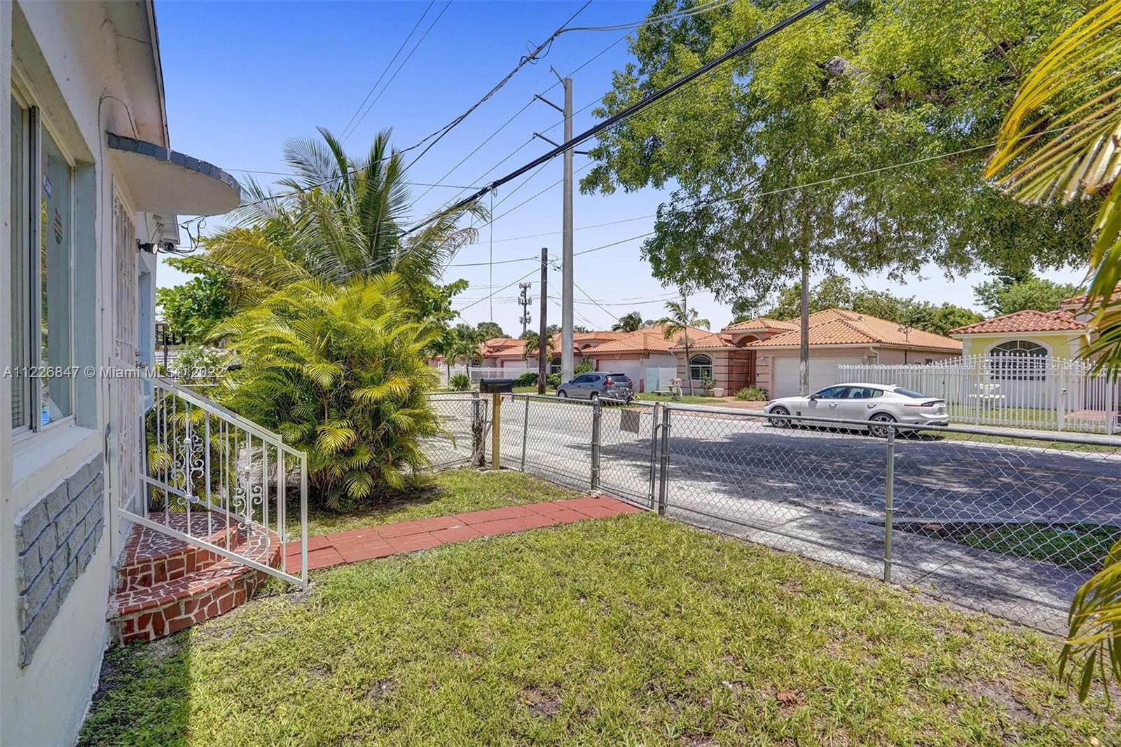 1554 Northwest 58th Street Miami, FL 33142 - Photo 42 of 57 a view of a backyard with plants