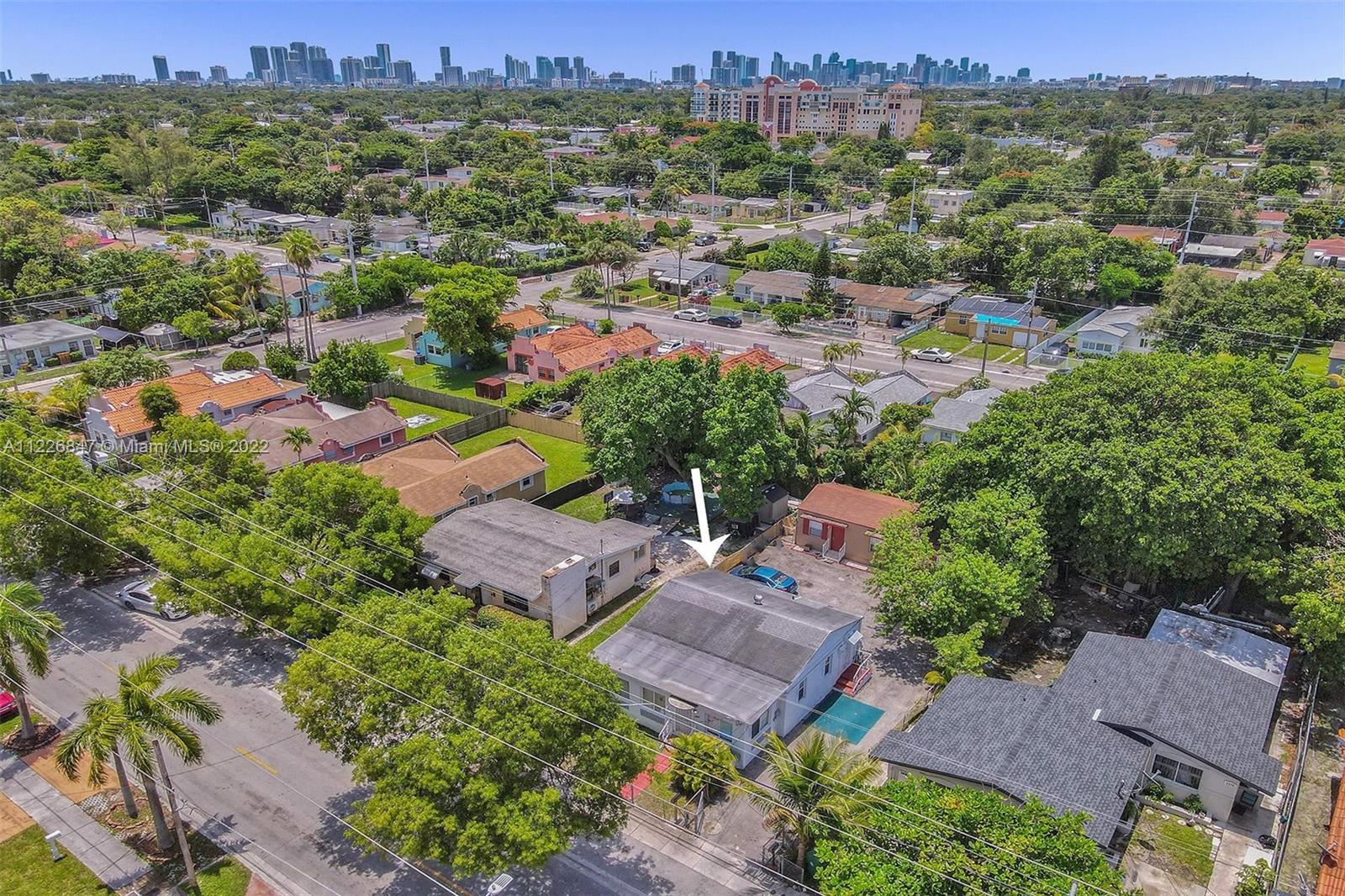 1554 Northwest 58th Street Miami, FL 33142 - Photo 46 of 57 an aerial view of residential houses with outdoor space and street view