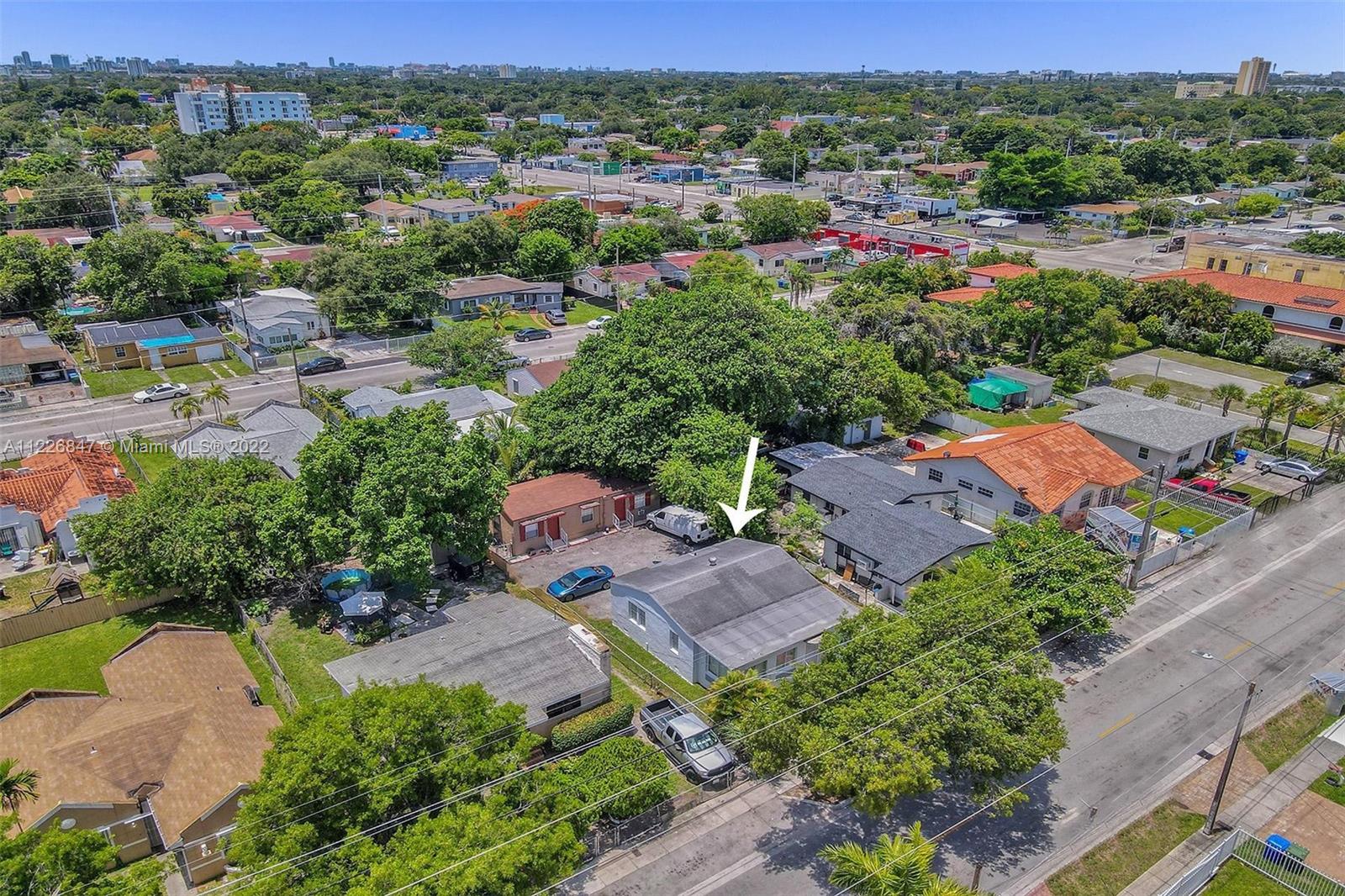1554 Northwest 58th Street Miami, FL 33142 - Photo 47 of 57 an aerial view of multiple house