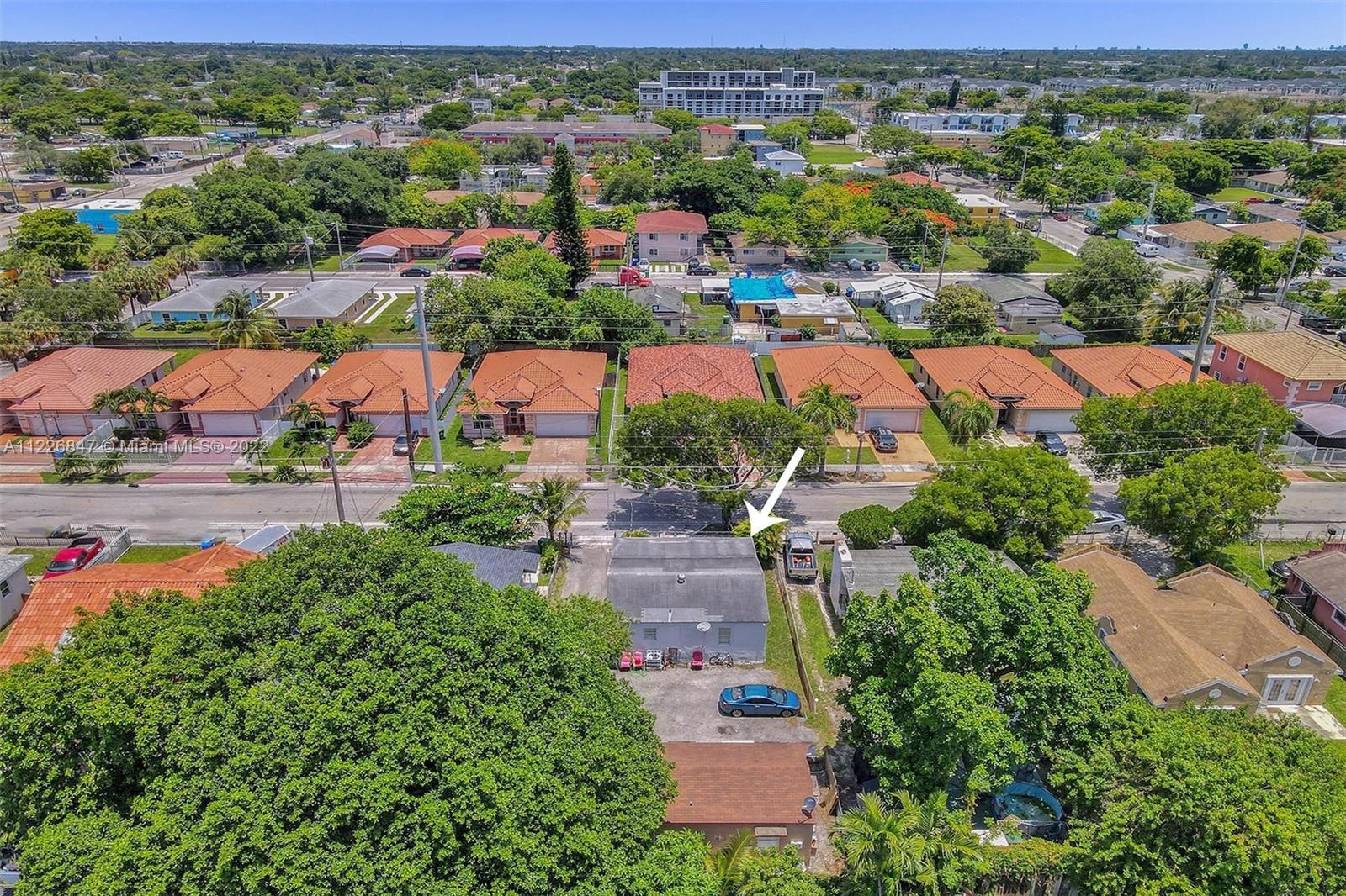 1554 Northwest 58th Street Miami, FL 33142 - Photo 50 of 57 an aerial view of residential houses with outdoor space and street view