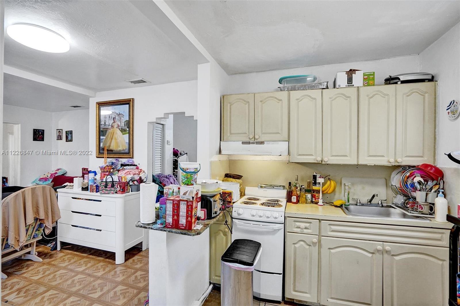 1554 Northwest 58th Street Miami, FL 33142 - Photo 6 of 57 Front - Kitchen in excellent conditions