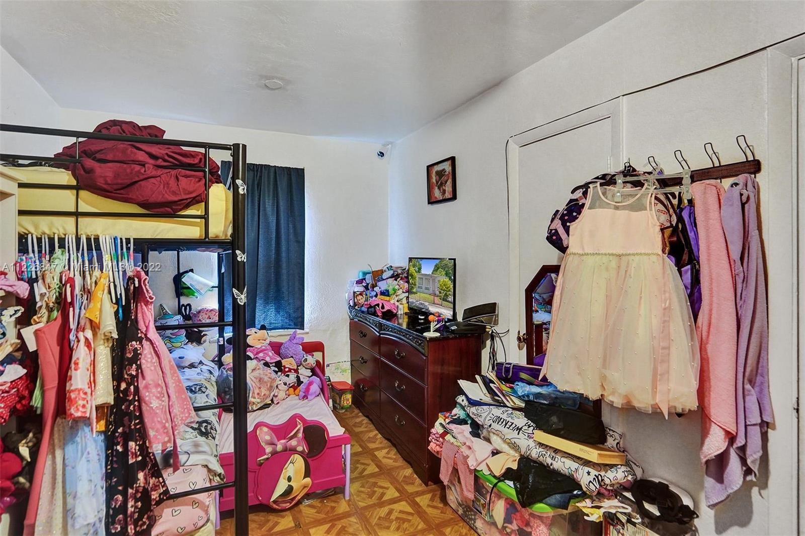 1554 Northwest 58th Street Miami, FL 33142 - Photo 9 of 57 a view of a room with gym equipment