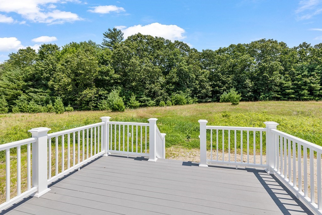 5 May Road Millis, MA 02054 - Photo 8 of 10 a view of a deck with a yard