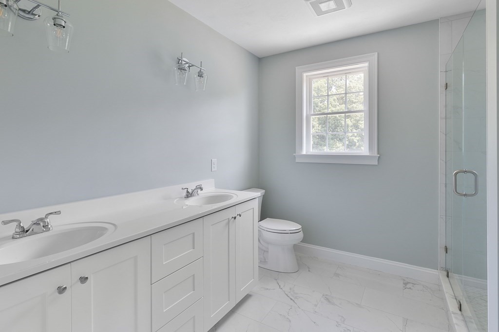 5 May Road Millis, MA 02054 - Photo 9 of 10 a bathroom with a sink and a toilet