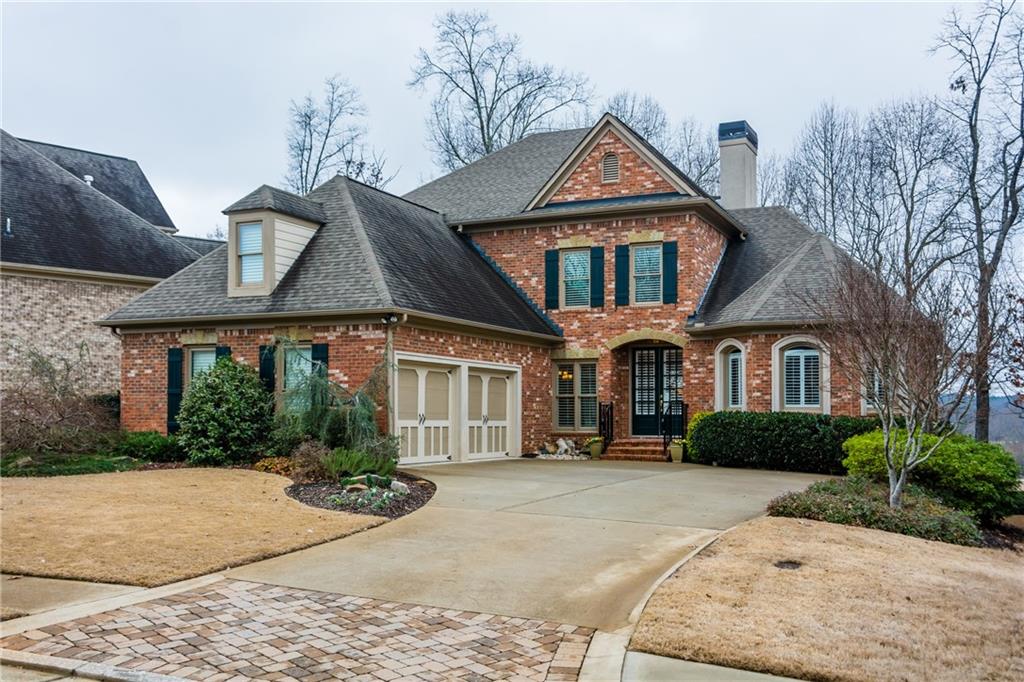 Stunning All Brick Golf course home with all the upgrades you are looking for.