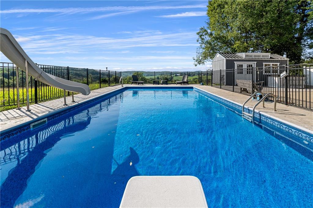 570 Steiner Bridge Road Valencia, PA 16059 - Photo 26 of 35 a view of balcony with wooden floor and outdoor seating