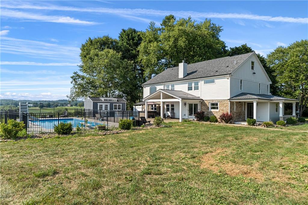 570 Steiner Bridge Road Valencia, PA 16059 - Photo 31 of 35 a front view of a house with a garden
