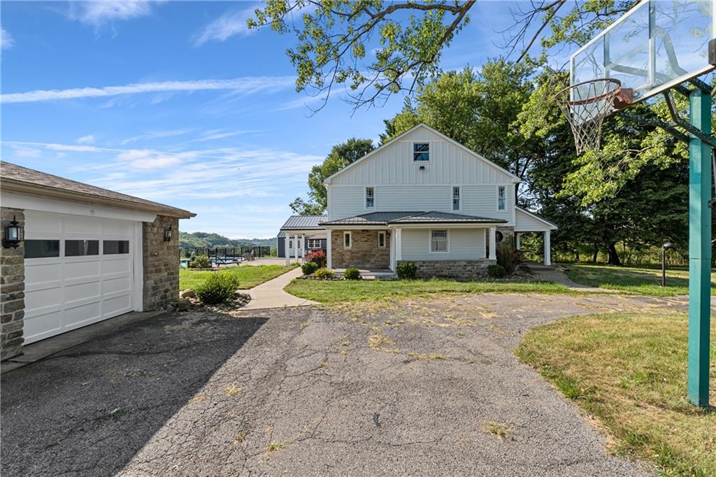570 Steiner Bridge Road Valencia, PA 16059 - Photo 32 of 35 a front view of a house with a yard
