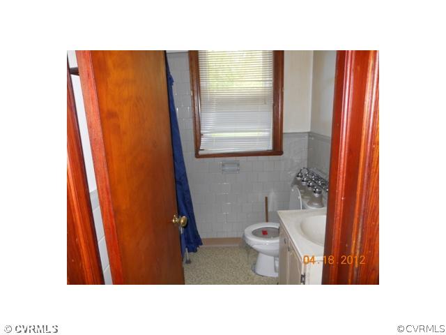 3633 Plainfield Road Richmond, VA 23234 - Photo 5 of 5 a bathroom with a sink and a toilet