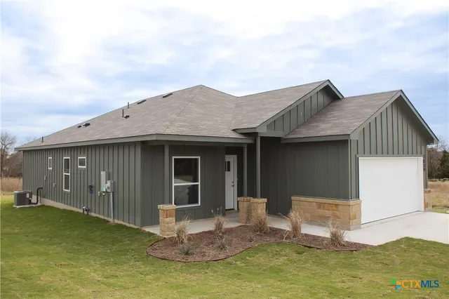 a view of a house with roof deck