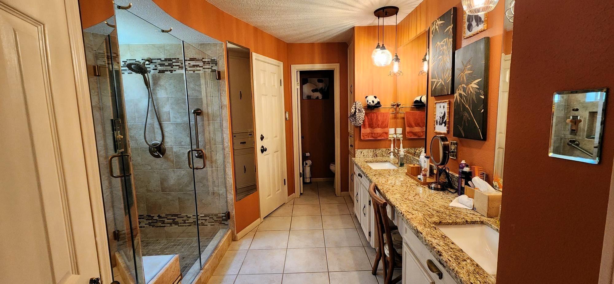 16155 Hexham Drive Spring, TX 77379 - Photo 26 of 47 a bathroom with a granite countertop shower a sink and a mirror