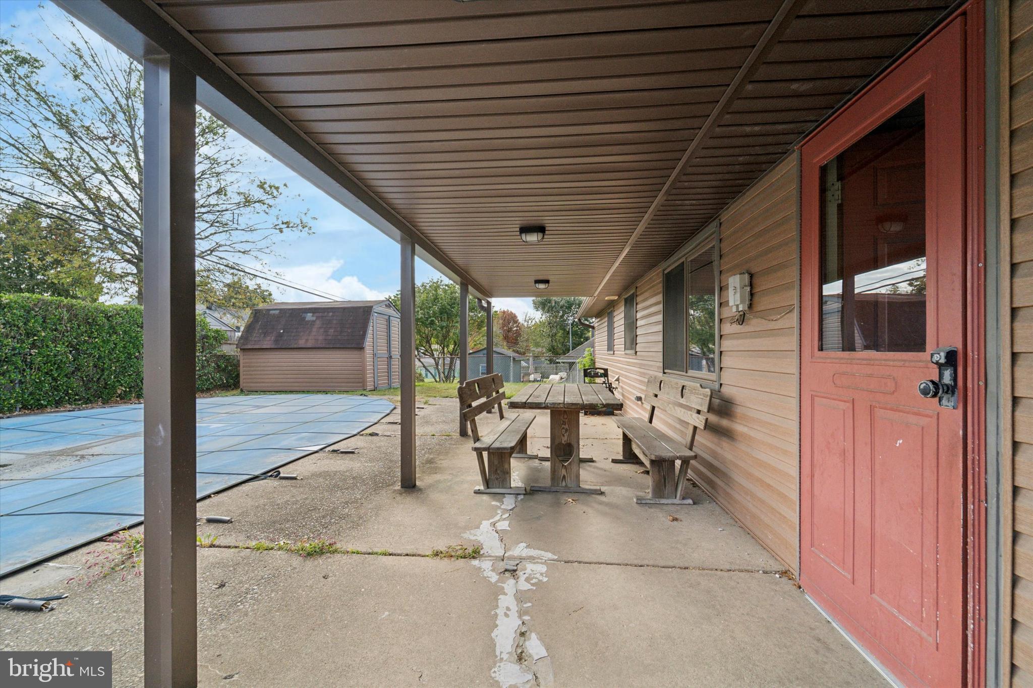 14 Cinnamon Road Levittown, PA 19057 - Photo 14 of 15 a view of a porch with chairs and backyard