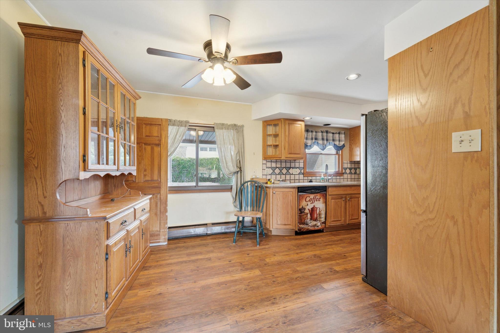 14 Cinnamon Road Levittown, PA 19057 - Photo 4 of 15 a open kitchen with stainless steel appliances granite countertop a refrigerator a sink and a stove