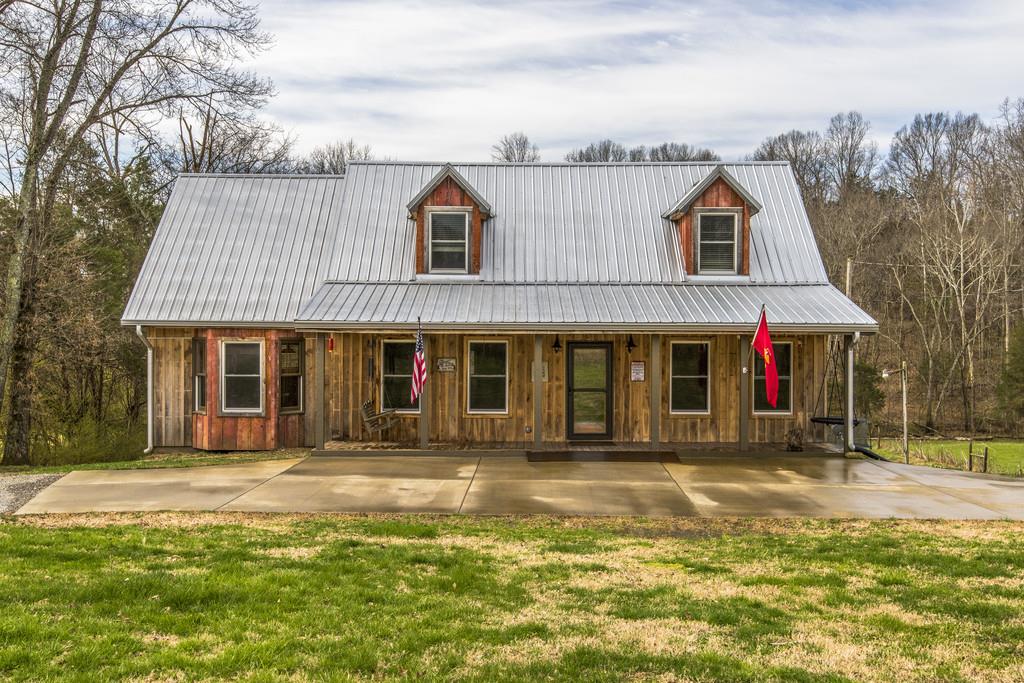545 Haley Road Burns, TN 37029 - Photo 1 of 30 a front view of a house with a yard