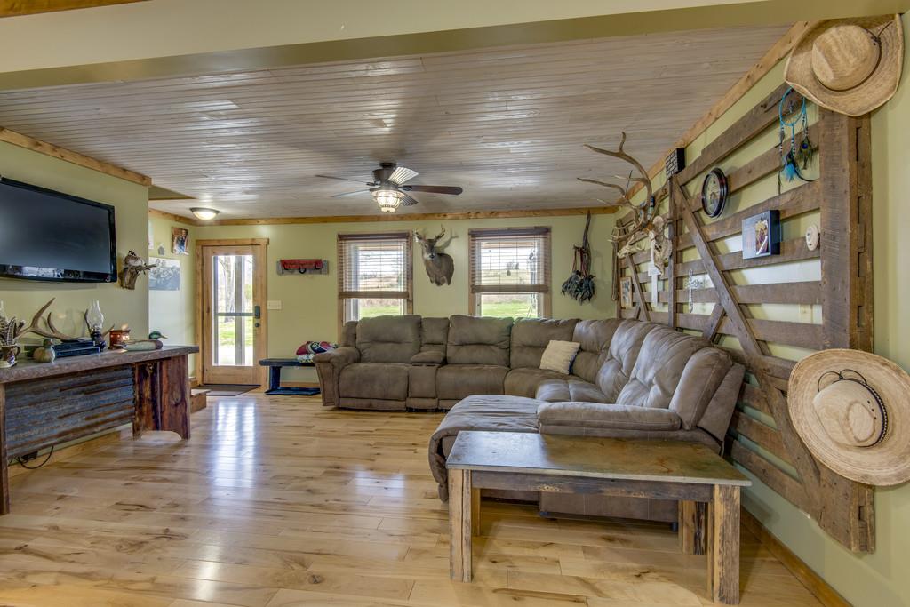 545 Haley Road Burns, TN 37029 - Photo 3 of 30 a living room with furniture and a flat screen tv