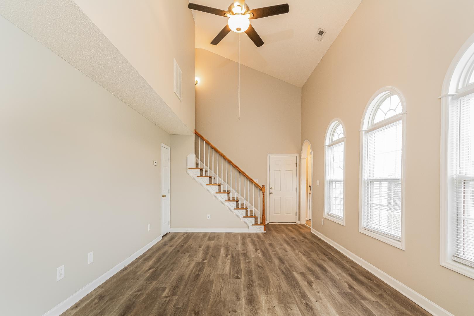 2100 McKinnon Drive Clayton, NC 27520 - Photo 4 of 17 a view of an entryway with wooden floor