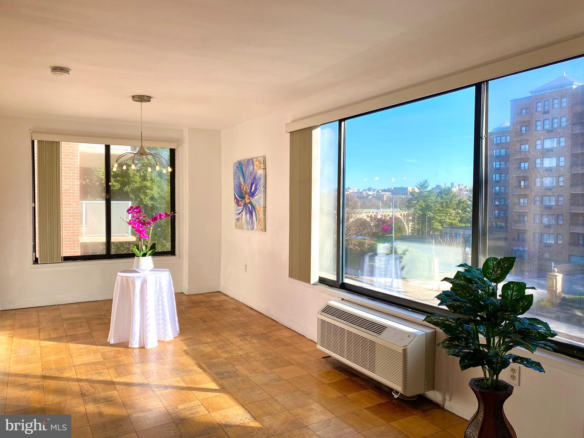2501 Calvert Street Northwest, Unit 401 Washington, DC 20008 - Photo 6 of 45 Big windows and full of light and nice view!