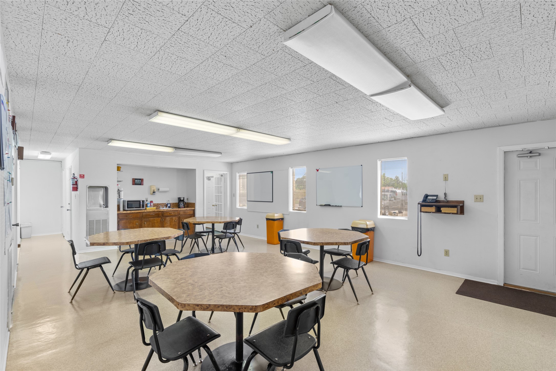 6910 Winton Street Houston, TX 77021 - Photo 12 of 50 a view of a dining room with furniture and wooden floor