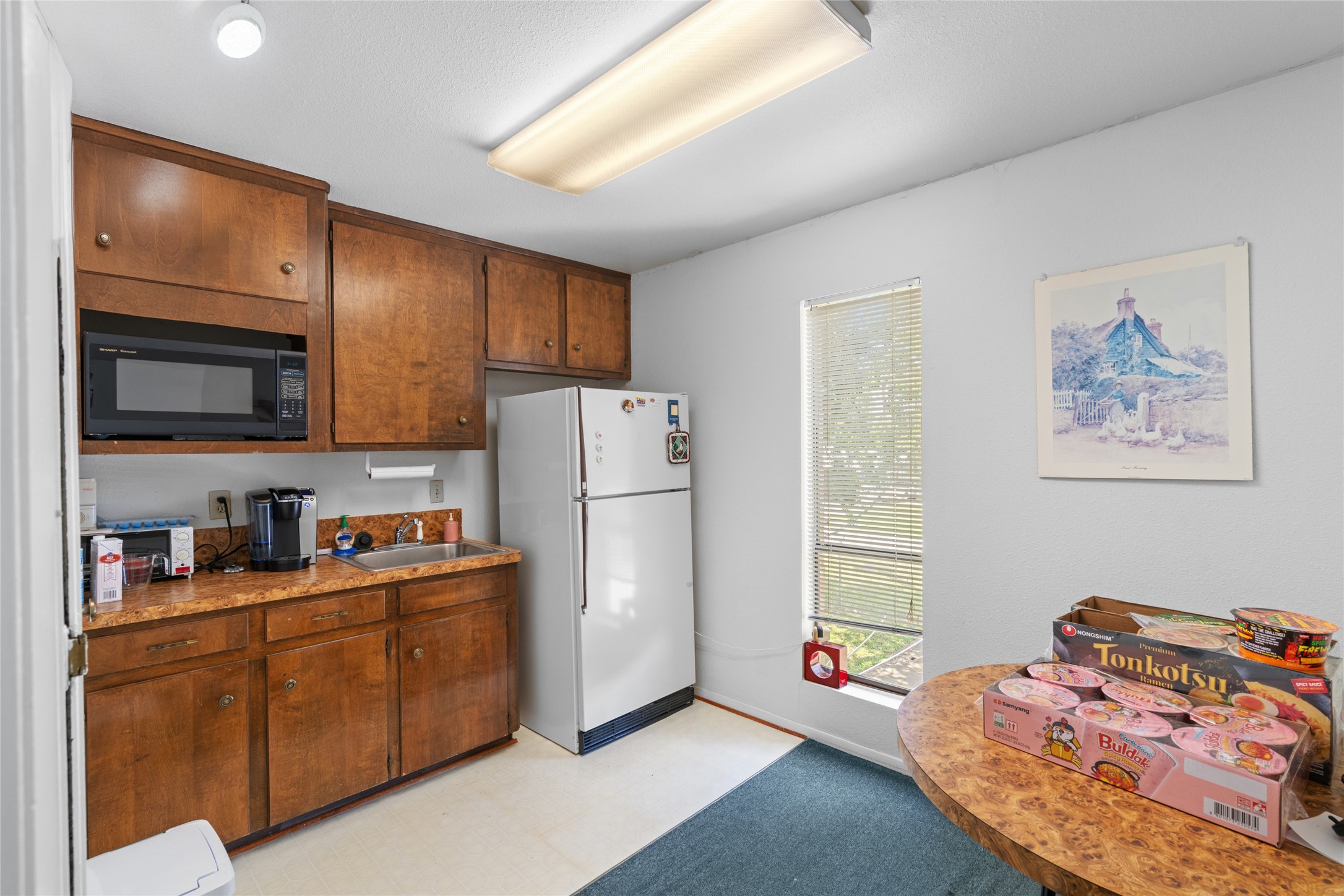 6910 Winton Street Houston, TX 77021 - Photo 27 of 50 a bed room with a bed and a television