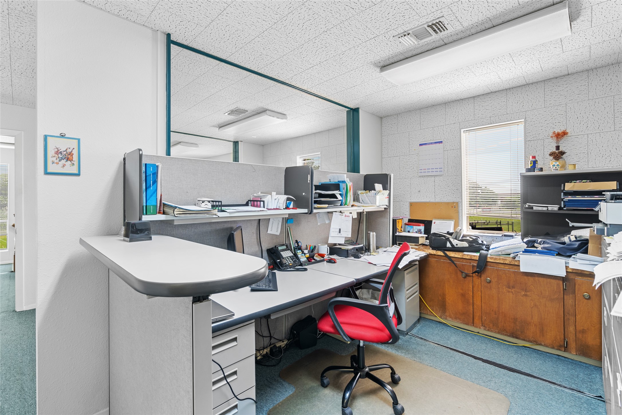 6910 Winton Street Houston, TX 77021 - Photo 32 of 50 a kitchen with a sink a stove and chairs
