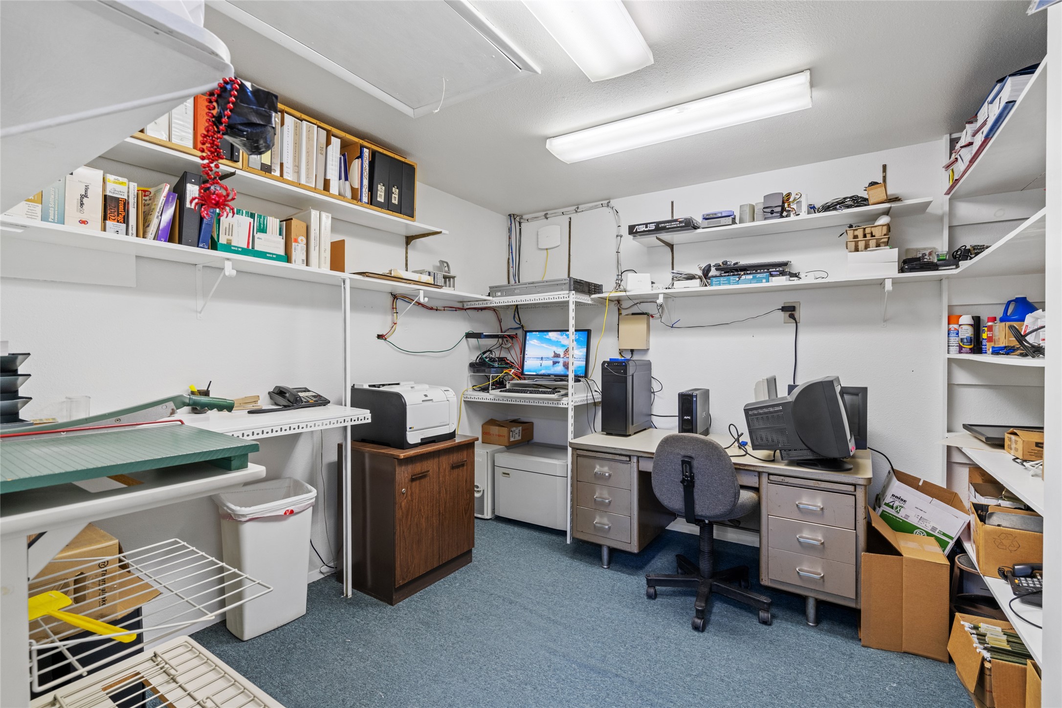 6910 Winton Street Houston, TX 77021 - Photo 34 of 50 a view of a workspace with furniture and toys