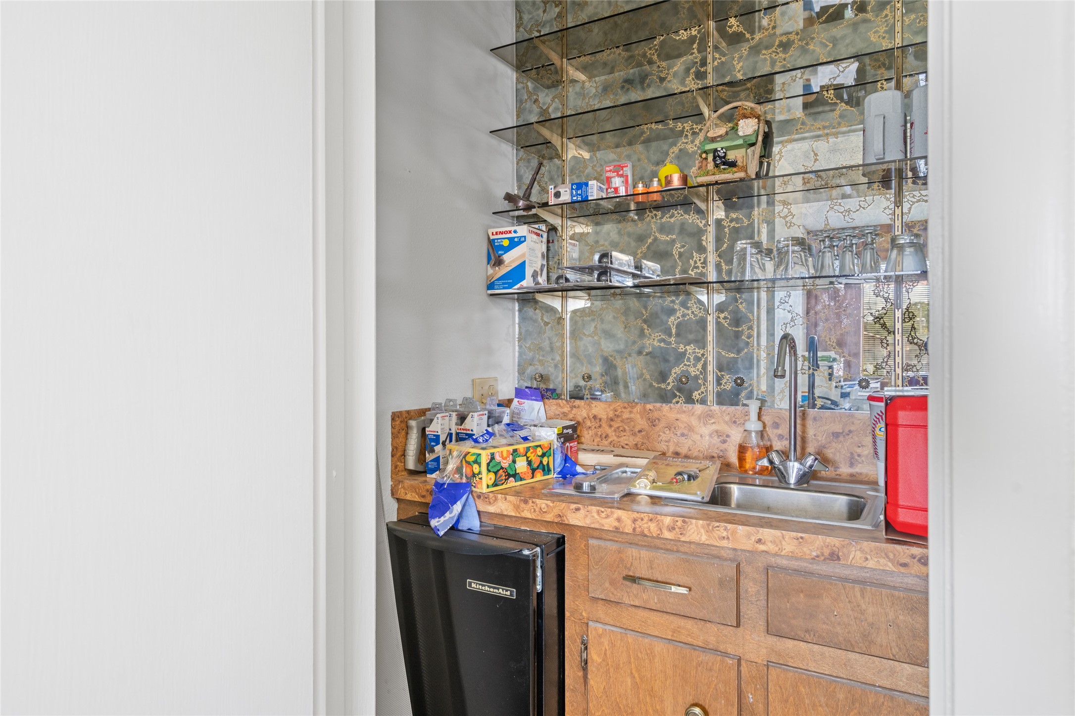6910 Winton Street Houston, TX 77021 - Photo 38 of 50 a kitchen with a sink and cabinets