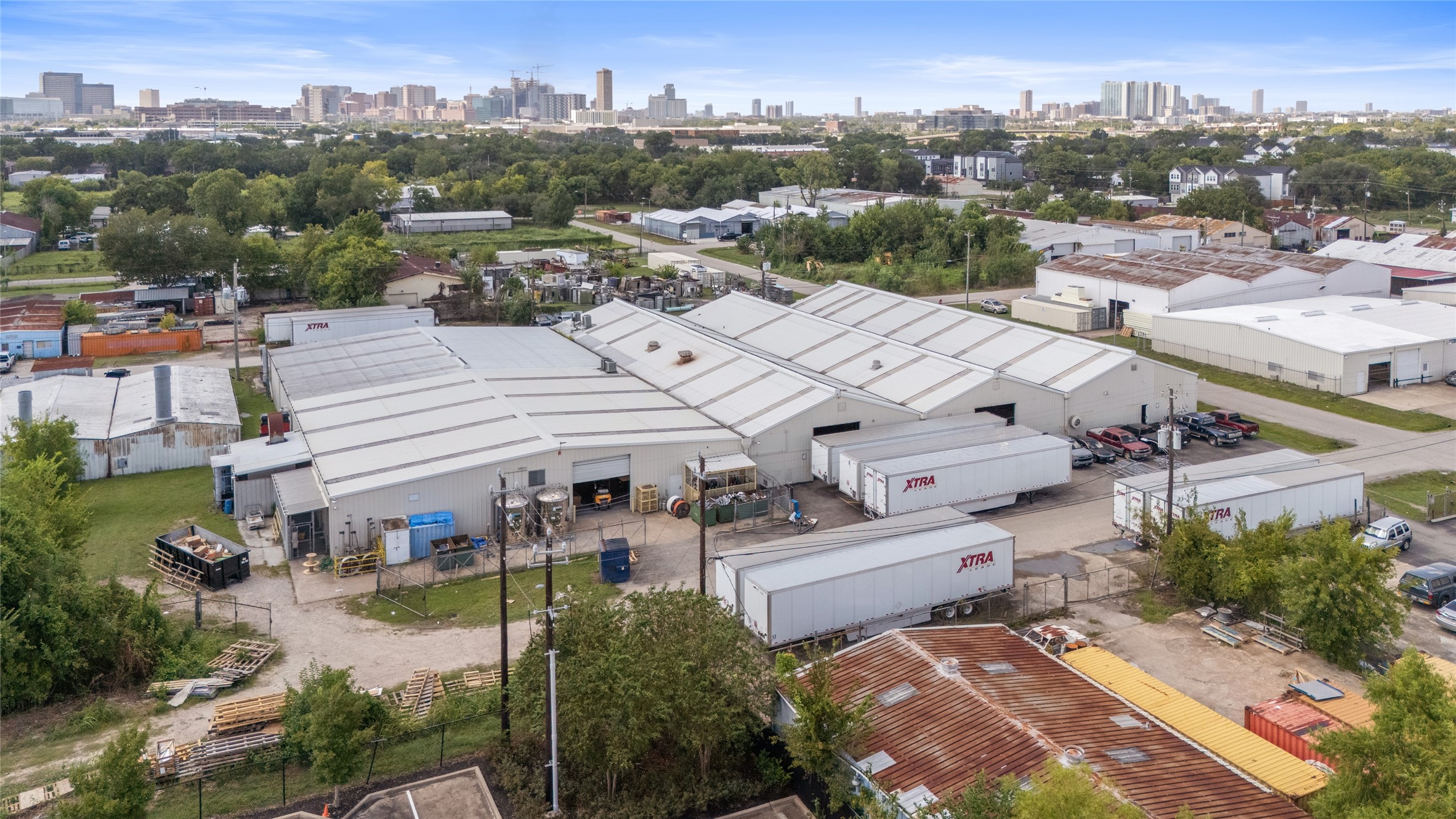 6910 Winton Street Houston, TX 77021 - Photo 48 of 50 an aerial view of a house with yard lake and city view
