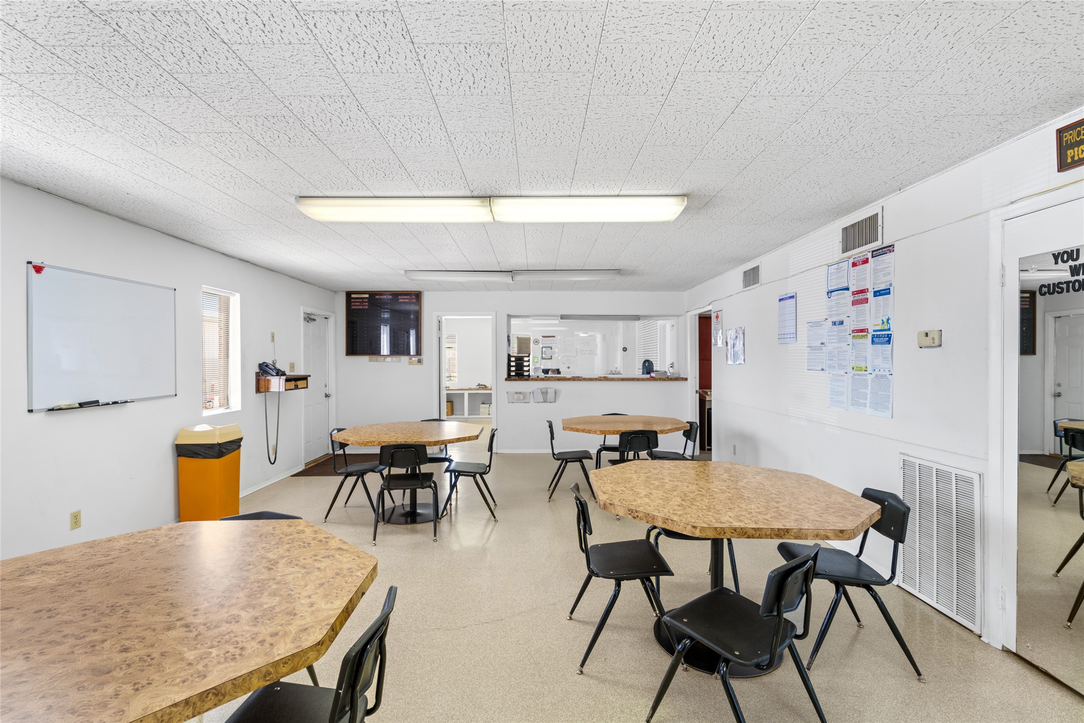 6910 Winton Street Houston, TX 77021 - Photo 10 of 50 a view of a dining room with furniture and wooden floor