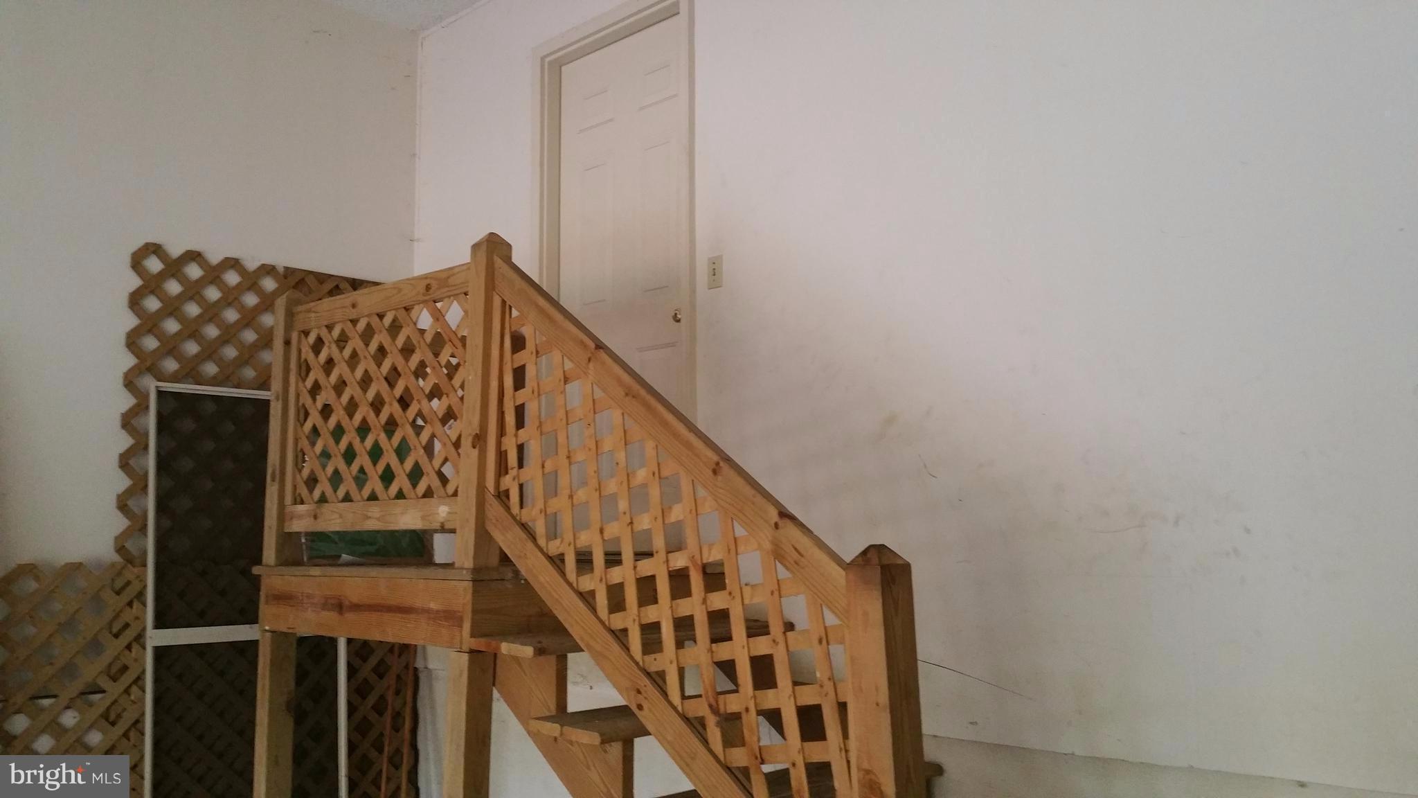 108 Indian Hills Road Locust Grove, VA 22508 - Photo 2 of 19 Garage Staircase