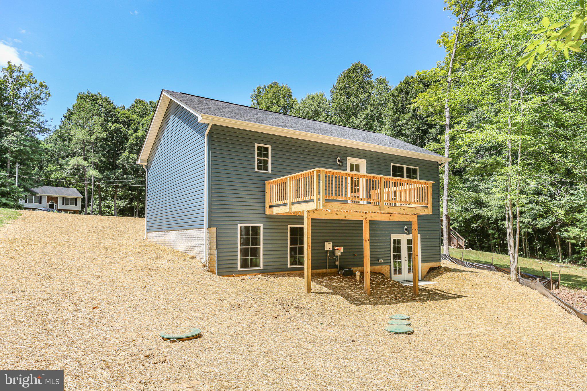 14 Johnson Drive Ruther Glen, VA 22546 - Photo 37 of 40 Back view of the house