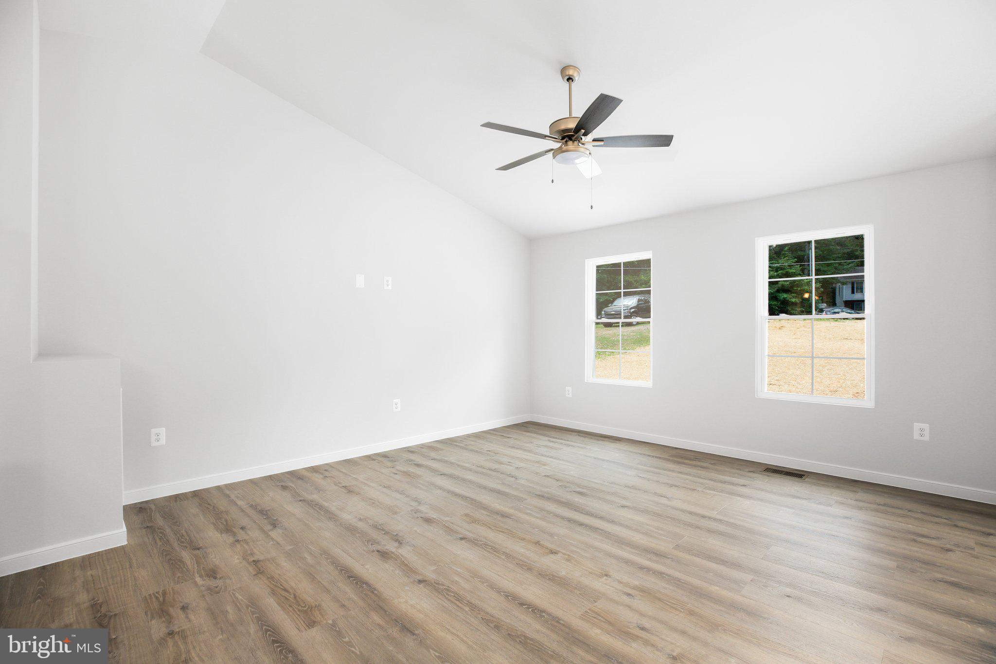 14 Johnson Drive Ruther Glen, VA 22546 - Photo 5 of 40 Family room with ceiling fan