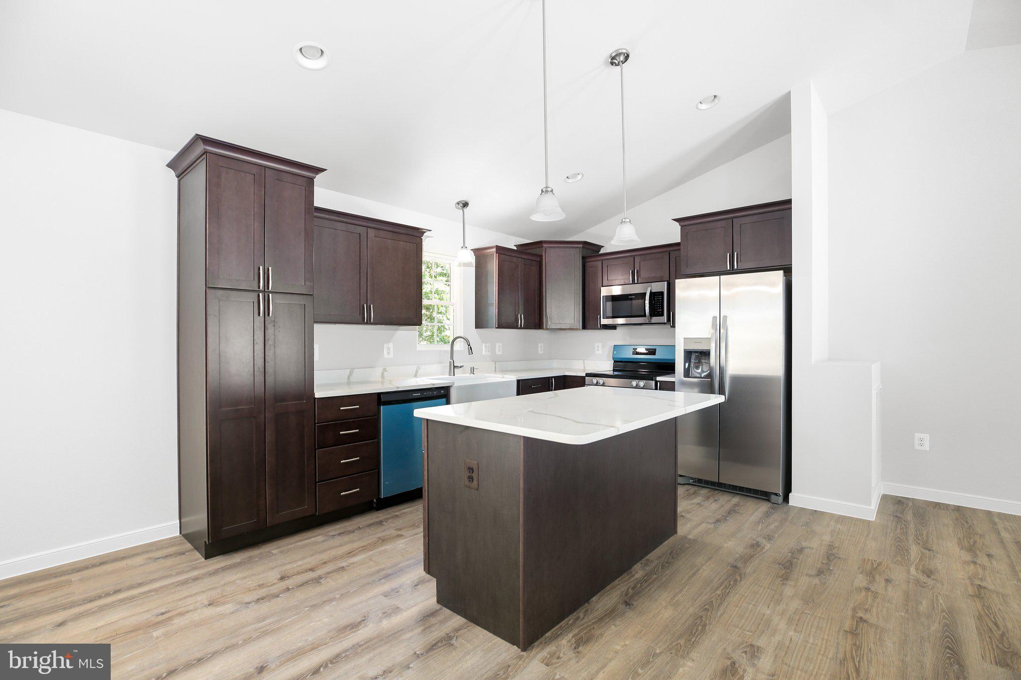 14 Johnson Drive Ruther Glen, VA 22546 - Photo 7 of 40 Kitchen with dark cabinets offer a nice contrast