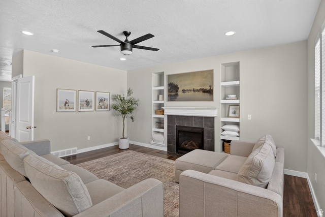 2178 Autumn Drive Mapleton, UT 84664 - Photo 12 of 48 Recessed lighting, dark wood-finish flooring, and a ceiling fan with integrated lighting