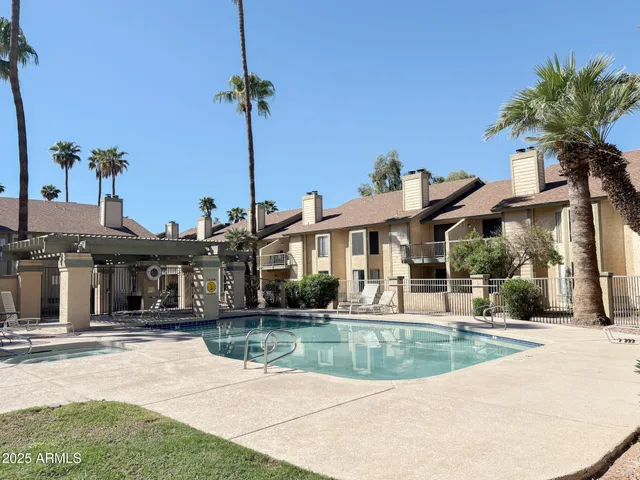 a view of a house with a swimming pool