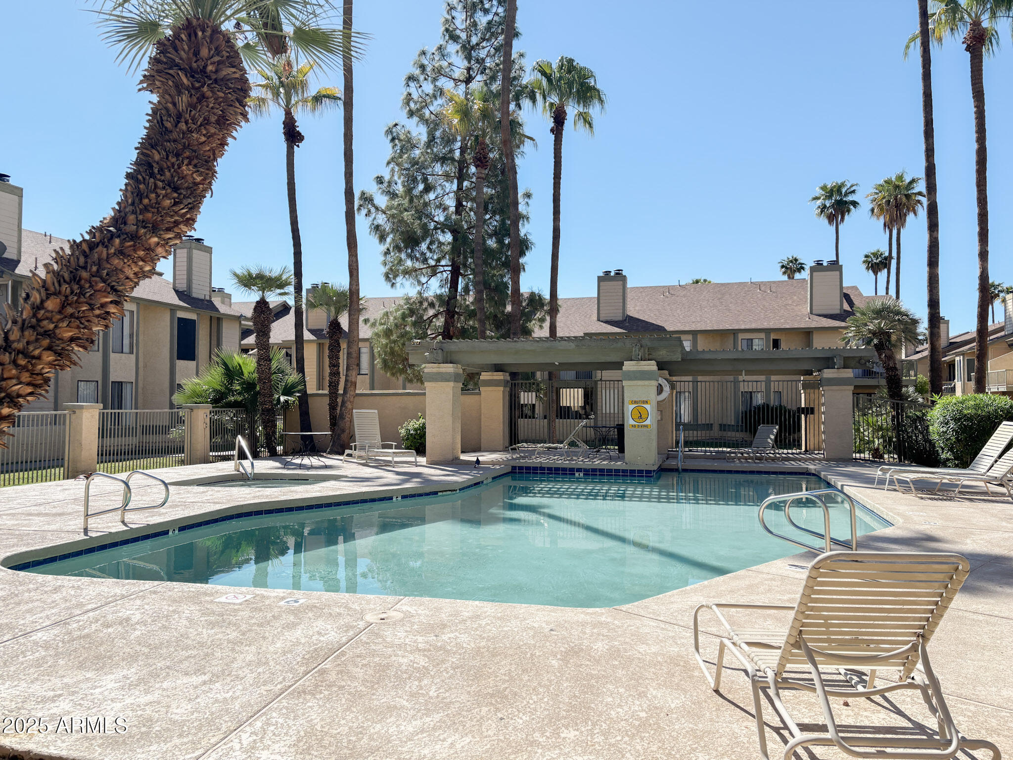 5236 West Peoria Avenue, Unit 212 Glendale, AZ 85302 - Photo 21 of 22 a view of a building with garden