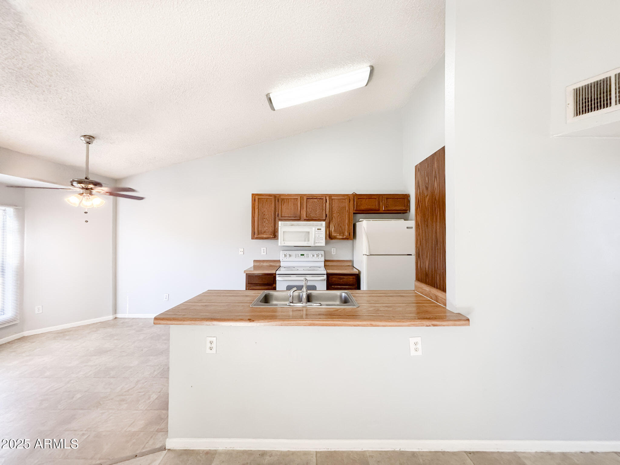 5236 West Peoria Avenue, Unit 212 Glendale, AZ 85302 - Photo 7 of 22 a bathroom with a sink vanity and mirror