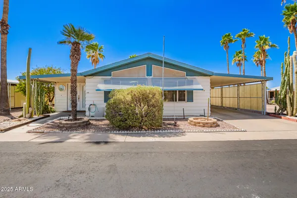 a front view of a house with a garage