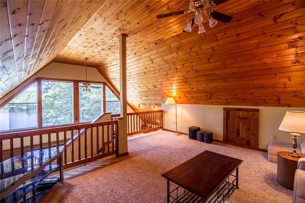 171 Barkers Pond Road Lyman, ME 04002 - Photo 9 of 35 view of the pond from the loft which...