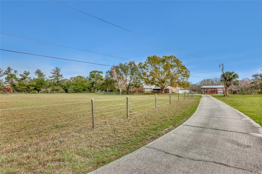 5005 Highway 1 Mims, FL 32754 - Photo 1 of 69 a view of a lake with a yard