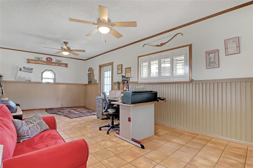 5005 Highway 1 Mims, FL 32754 - Photo 14 of 69 a living room with furniture and a window